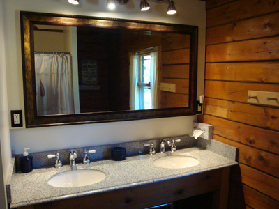 Main Floor bath with slate floor and double granite vanity