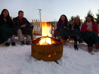 guests enjoying the outdoor fire pit